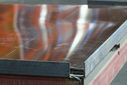 Лист оцинкованный, 1,25×2 м, толщина 0,4 мм, RAL 8017, в защитной плёнке